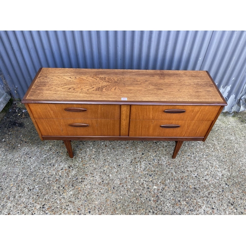 57 - A mid century teak four drawer chest / sideboard by homeworthy