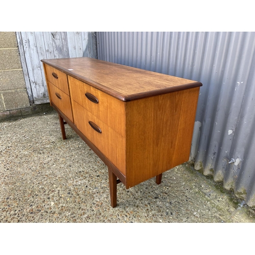 57 - A mid century teak four drawer chest / sideboard by homeworthy