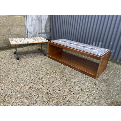 64 - A rectangular teak tile top coffee table together with a tile top trolley