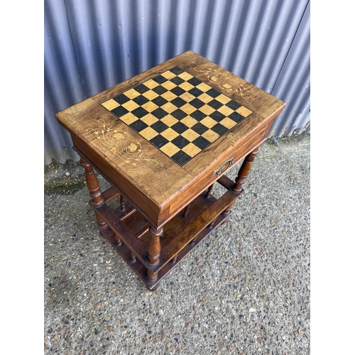 72 - An Edwardian inlaid fold over games table with drawer