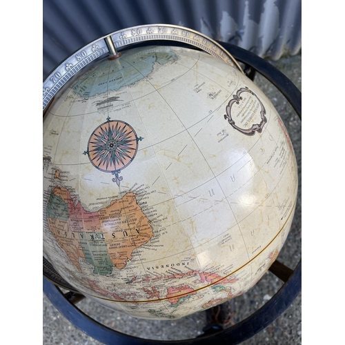 73 - A modern brass framed floor standing celestial globe