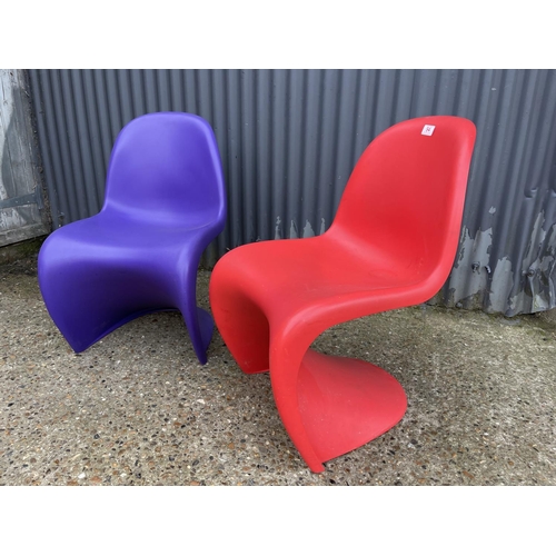 94 - Two vener panton designer chairs by VITRA one red and one purple