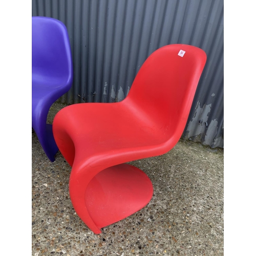 94 - Two vener panton designer chairs by VITRA one red and one purple