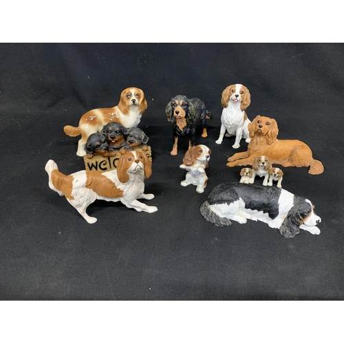 1026 - Beswick Spaniel Figure and eight other dog figures