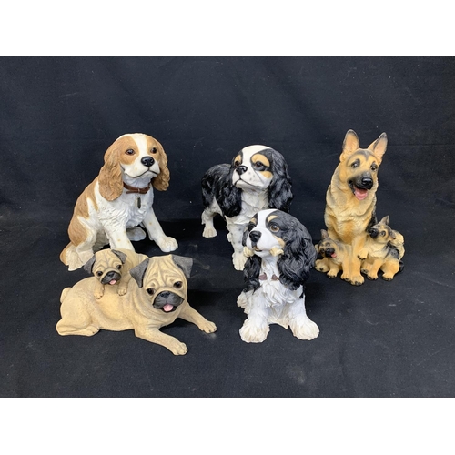 1027 - Five large Resin Dog Figures