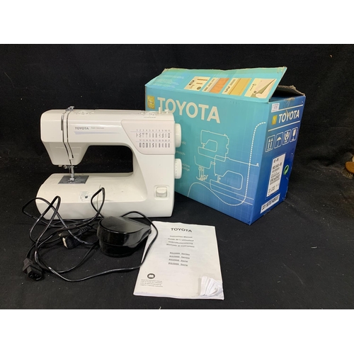 1076 - Toyota Electric Sewing Machine with pedal