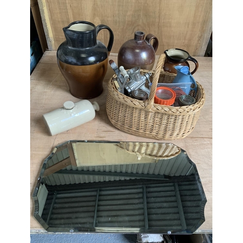 1082 - Frameless mirror, Basket and kitchenalia, flagon and two Stoneware jugs