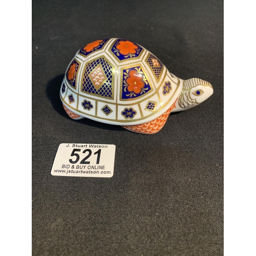 521 - Royal Crown Derby Tortoise Paperweight with gold stopper, length 12 cms