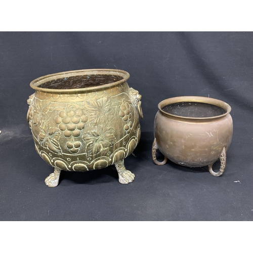 527 - Large embossed Brass Jardiniere on lion paw feet height 33 cms, diameter 29 cms and one other brass ... 