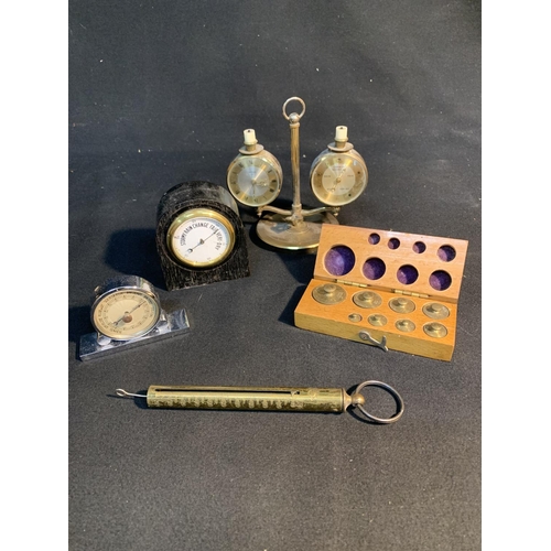 574 - Swiza Clock barometer, two small barometers, balance scale and set of weights