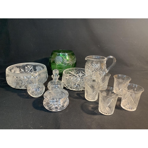 594 - Two cut glass bowls and jug, green cut glass bowl height 18 cms, diameter 14 cms plus other glasswar... 