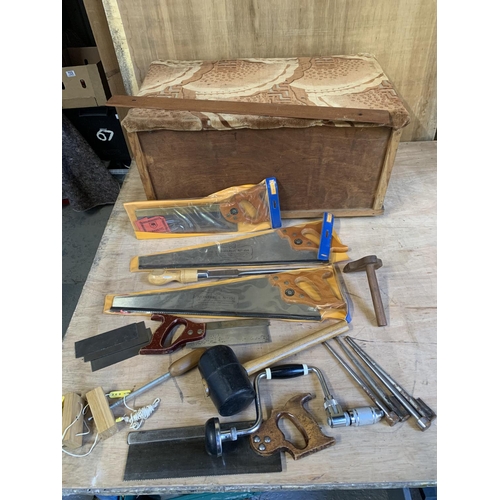 731 - Three Tyzack saws, brace, tools and toolbox