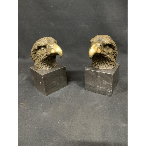 759 - Pair of Bronze Eagle Head Desk ornaments height 20 cms, on marble bases