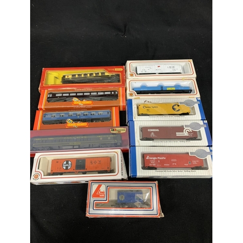 838 - Twelve boxed 00/HO gauge Carriages and rolling stock assorted makes (11 in photo)