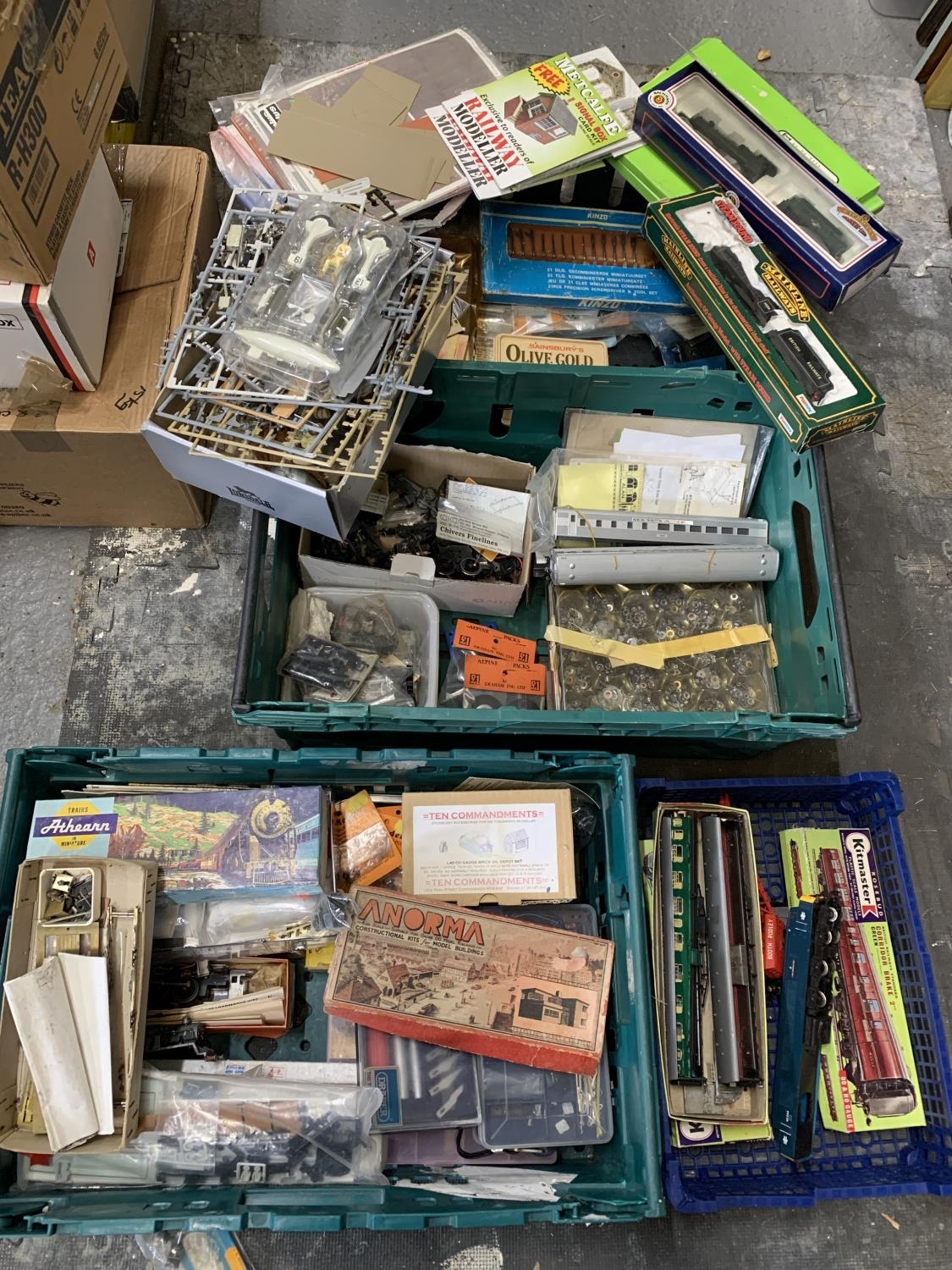 Three trays of model railway parts