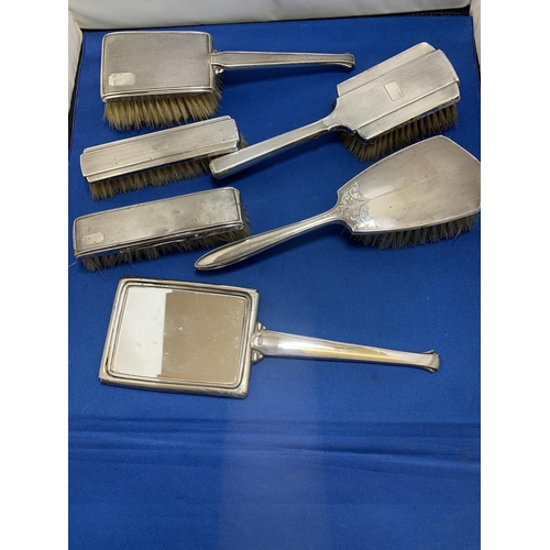 872 - Five Hallmarked Silver dressing table brushes and hand mirror