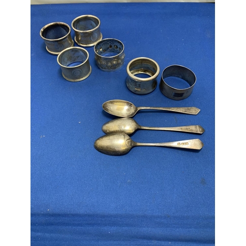 875 - Three Hallmarked Silver teaspoons, two Hallmarked Silver Napkin Rings, total Silver weight 2.78 ozt ... 