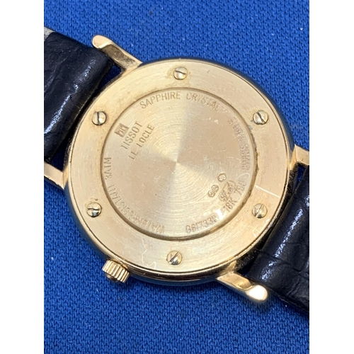 890 - Ladies Tissot 18ct Gold Watch with original strap