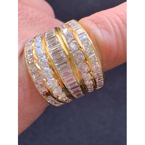 903 - 18ct Gold Multistone Diamond Dress Ring marked 18k 750, size R/S, 19.6 gms. Missing stone is present