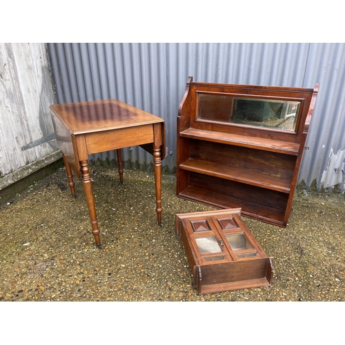 10 - A Victorian Pembroke table, a mahogany mirrored hall shelf and an oak smokers cabinet