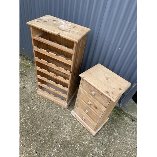 101 - A solid pine wane rack together with a pine chest of four drawers