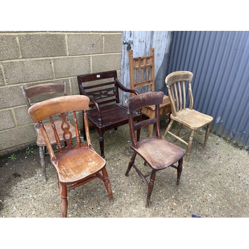 102 - A mahogany carver chair together with five other assorted kitchen chairs