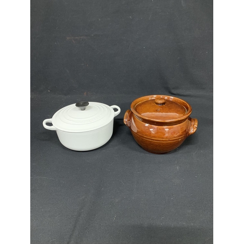 1063 - White Le Creuset Casserole (in good condition) and one other casserole