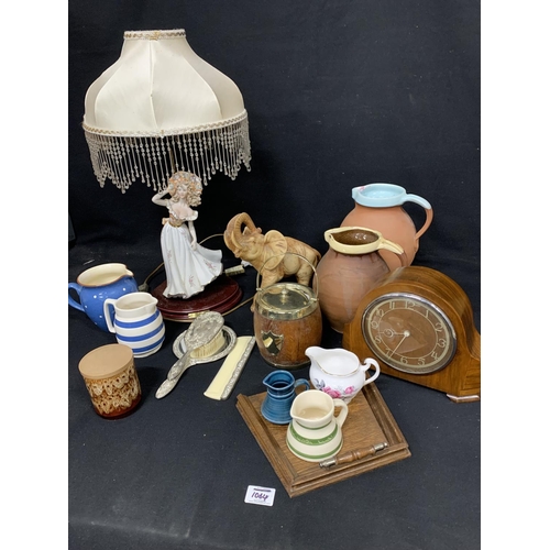 1064 - Lady lamp, two terracotta jugs and sundry items