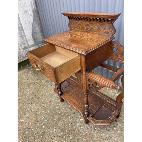 109 - An oak single drawer hallstand