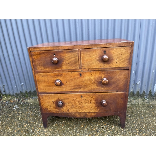 12 - A small victorian mahogany chest of four drawers