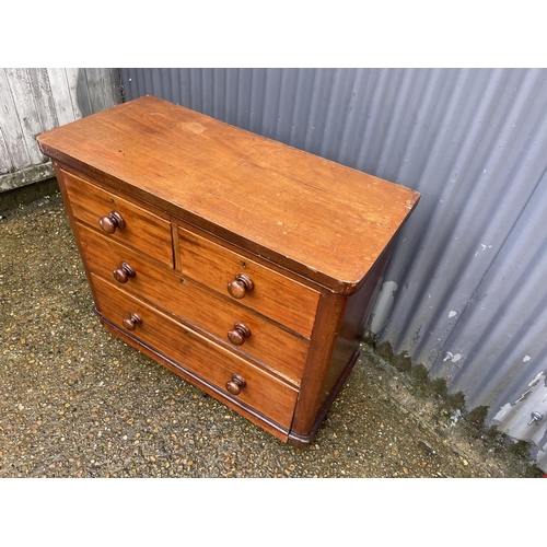 13 - A Victorian mahogany chest of four drawers