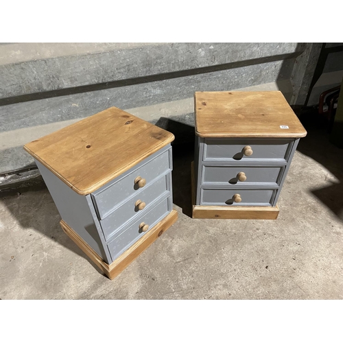 133 - A pair of grey painted pine bedside chests of three drawers