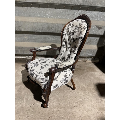 134 - A victorian mahogany spoon back chair with white and black pattern upholstery