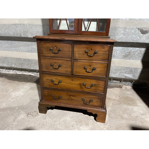 137 - A victorian and later mahogany bookcase cupbaord