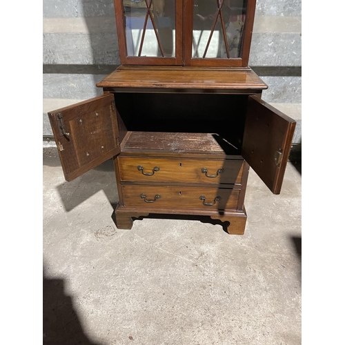 137 - A victorian and later mahogany bookcase cupbaord