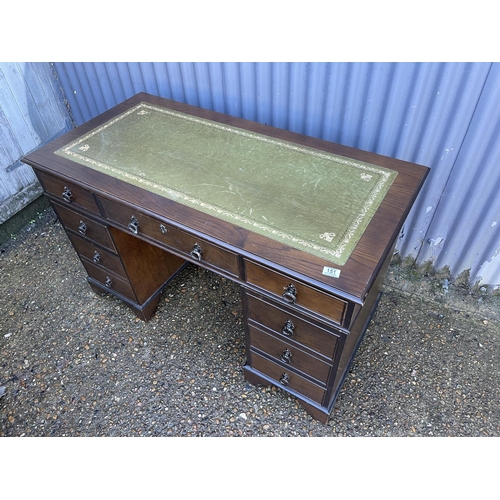 151 - An oak twin pedestal office desk with a green leather top