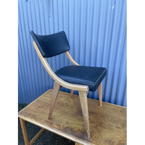 152 - A mid century oak writing desk together with a black vinyl BENCHAIR office chair