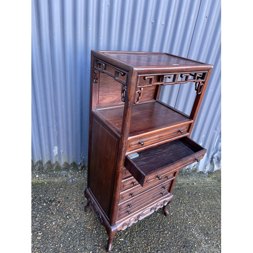 163 - An oriental hardwood six drawer music cabinet. / chest