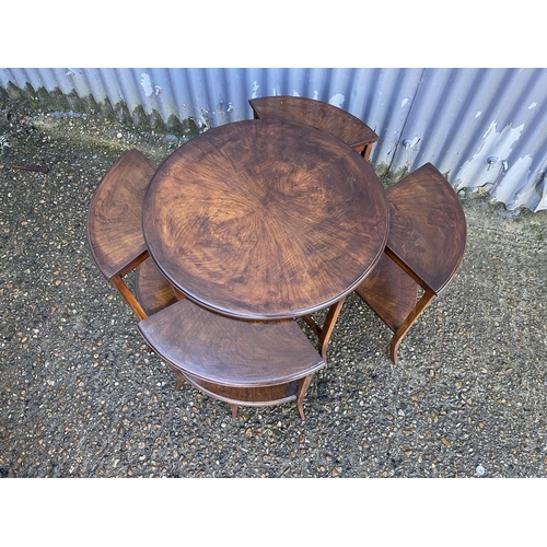 167 - An Edwardian mahogany circular nest of five tables