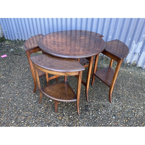 167 - An Edwardian mahogany circular nest of five tables