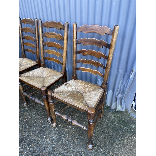 170 - A set of five ladder back dining chairs with rush seats