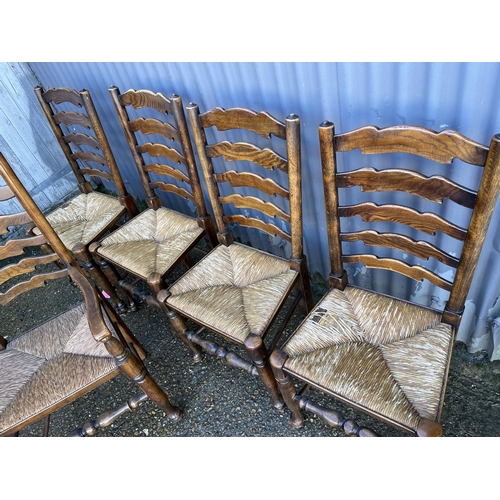 170 - A set of five ladder back dining chairs with rush seats