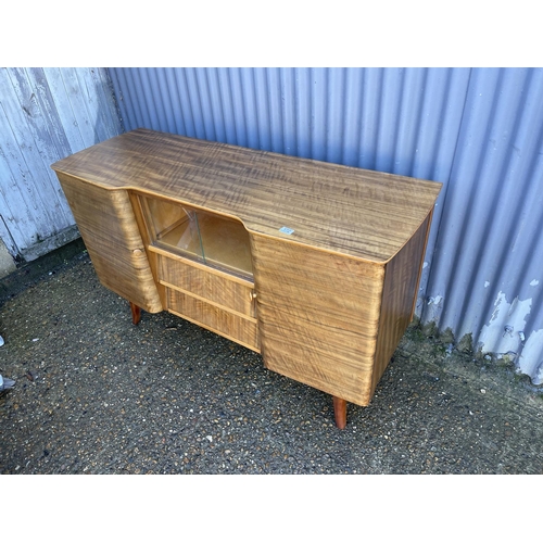 172 - A mid century cocktail  sideboard