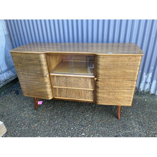 172 - A mid century cocktail  sideboard