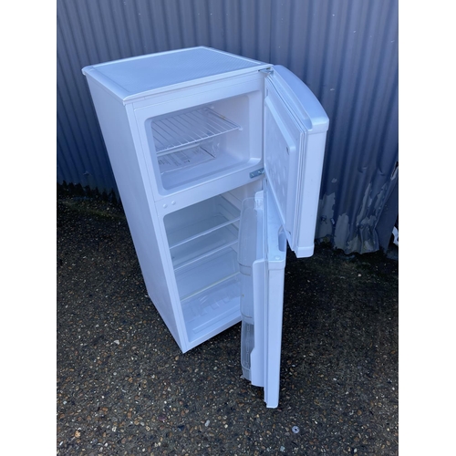 189 - A compact size fridge freezer