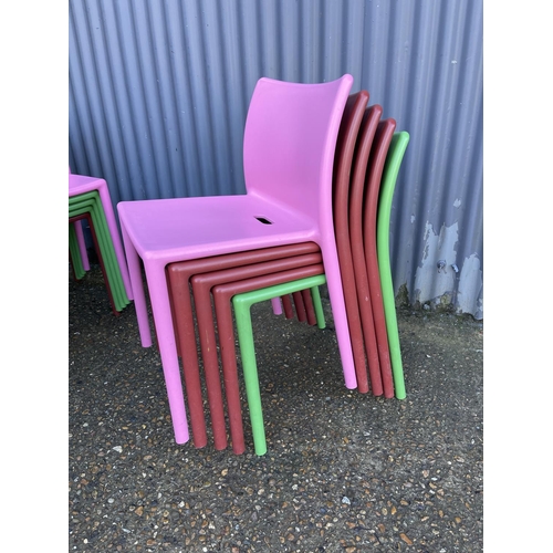 201 - 10 multicoloured stacking chairs marked AIR CHAIRS