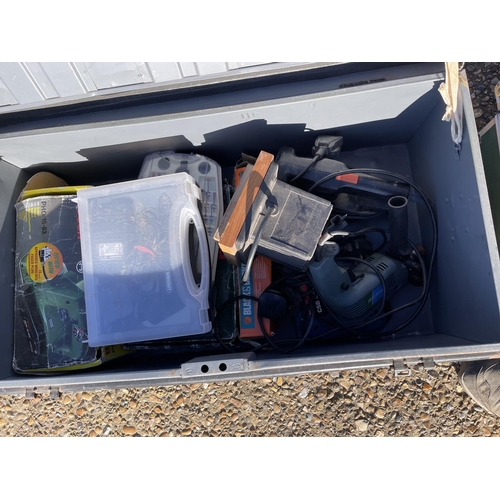 207 - Two tin trunks containing power tools together with. Cased Bosch sander