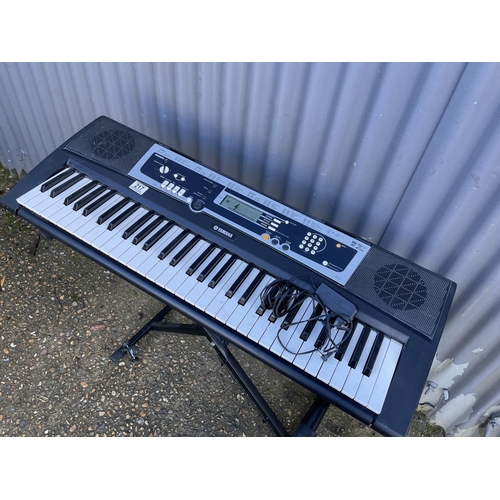 217 - Yamaha keyboard on folding stand