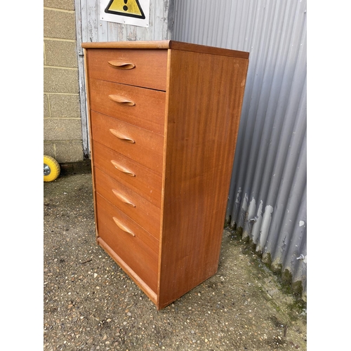 237 - A teak tallboy chest of six drawers