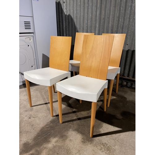 24 - A set of four modern dining chairs labelled MISS TRIP by stark